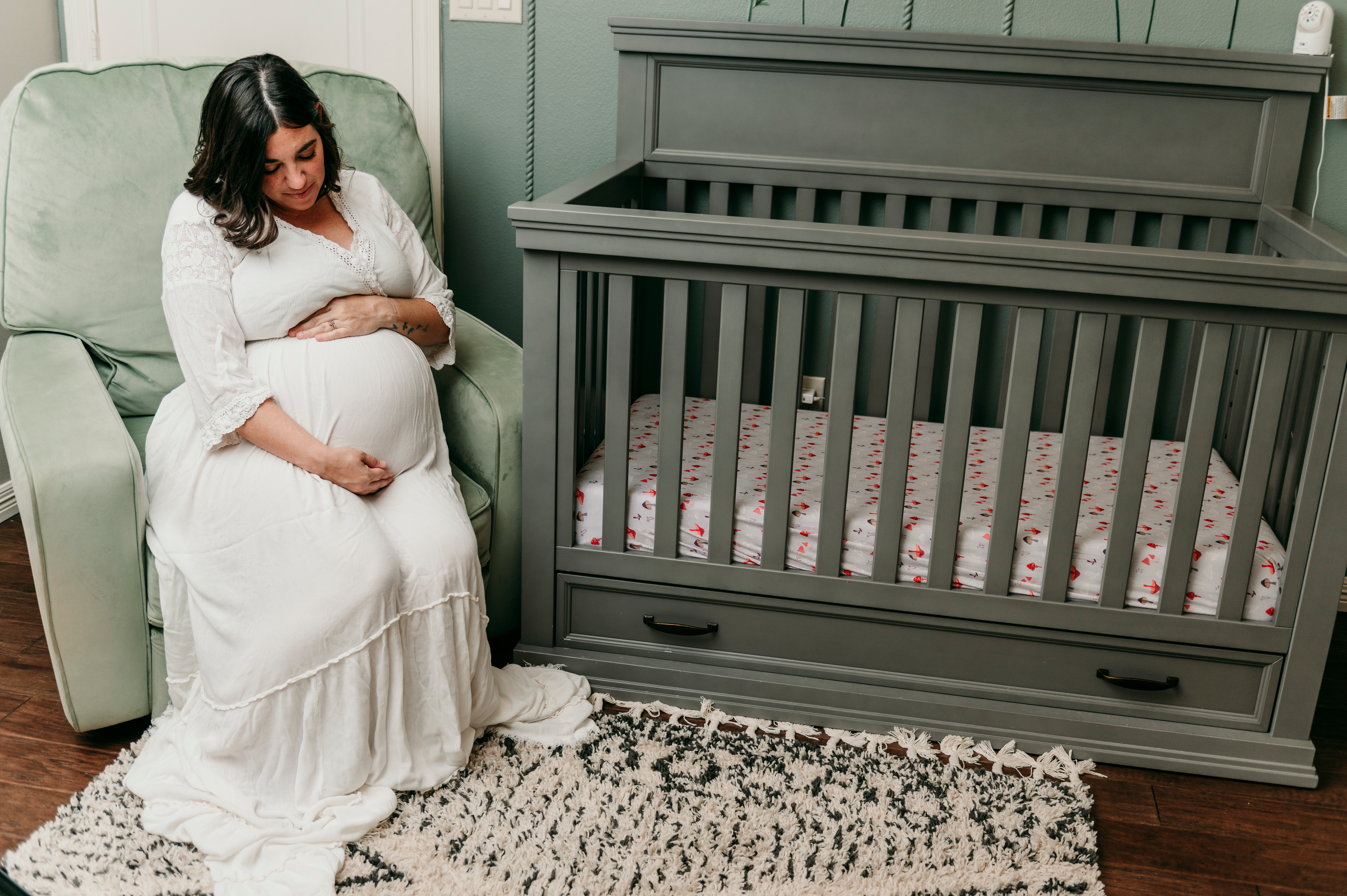 pregnant mother enjoying nursery